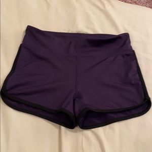 Purple athletic spandex shorts